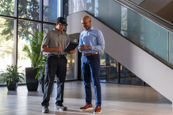 pest technician in office